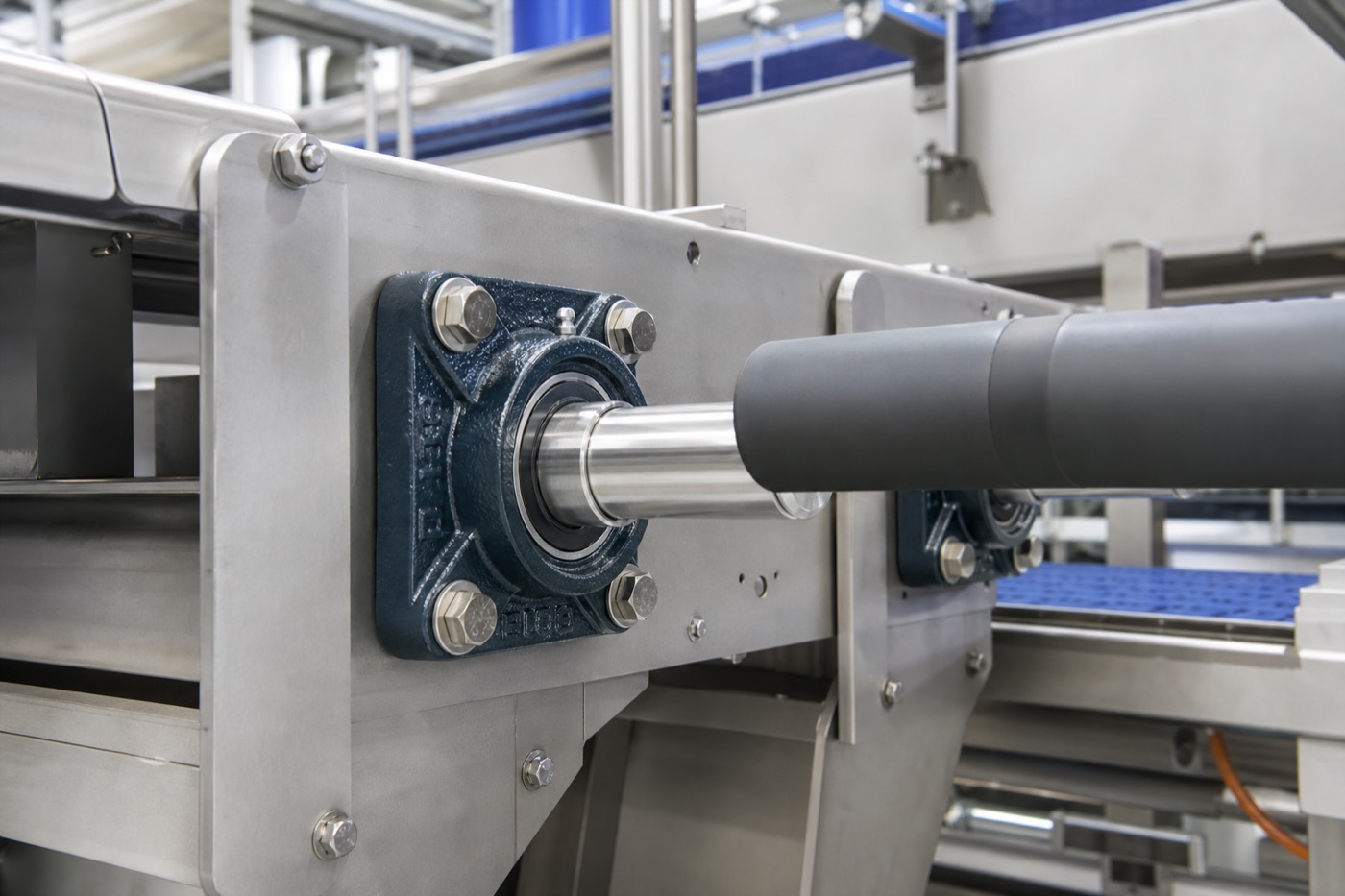 Flange bearing unit installed on conveyor shaft and side plate in industrial equipment